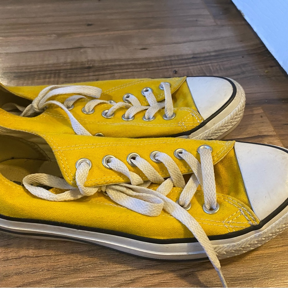 Yellow and white converse